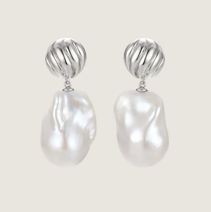 Irregular baroque pearl conch earrings