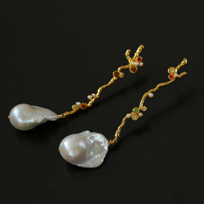 Long branch baroque pearl earrings